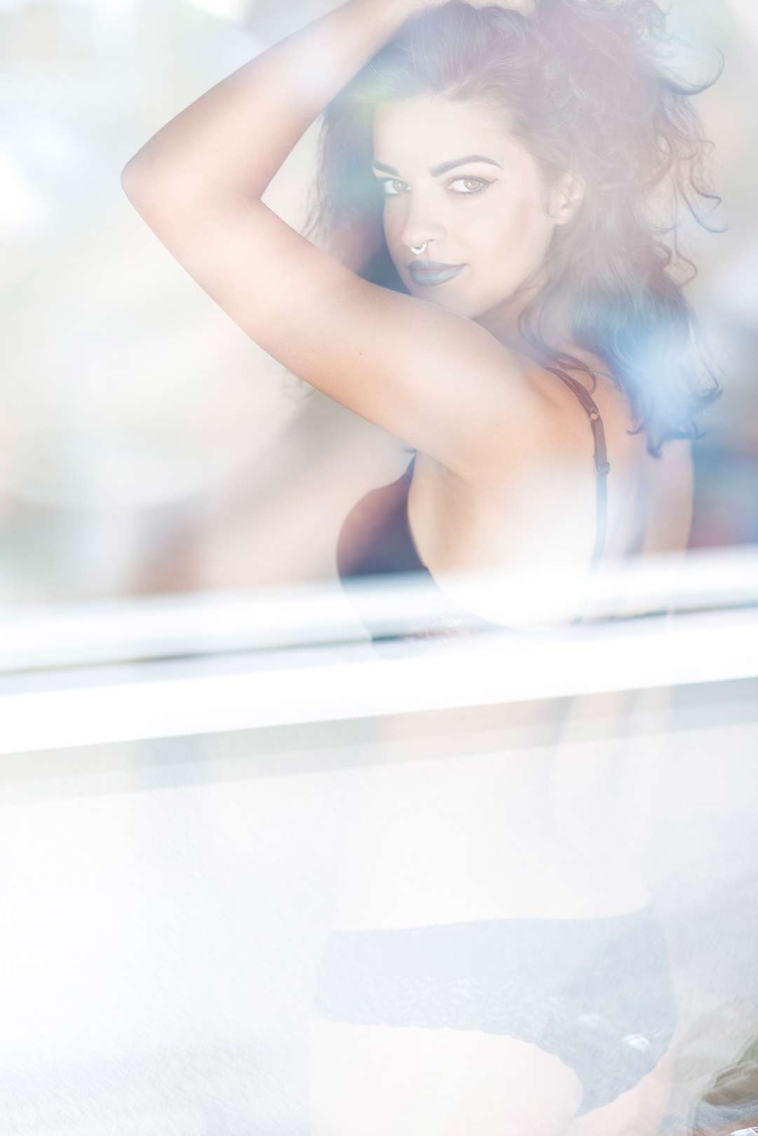 hot girl jessy in dessous through the window. erotic shooting munich